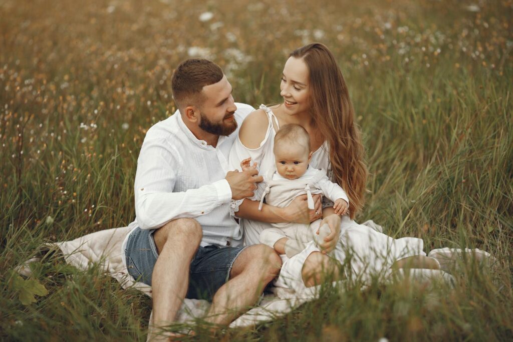 Parents with Baby on Grass